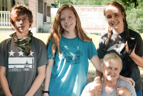 group-of-3-youth-with-elderly-female-homeowner